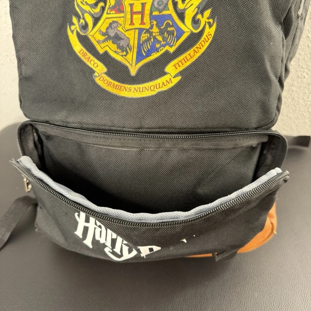 HARRY POTTER black Back Pack With Brown Leather Accents And House Crest Logo